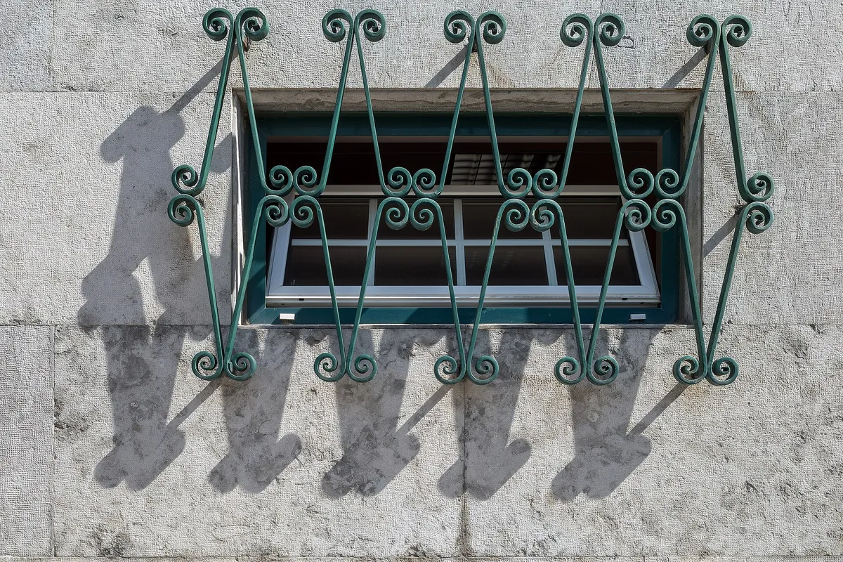Barred window, Xavier Cordeiro Street, Lisbon, Portugal julesvernex2