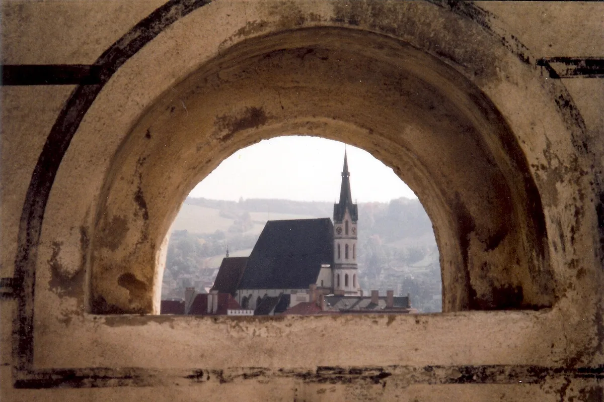 Cesky Krumlov Oct 1993 view to St Vit's church thru archway