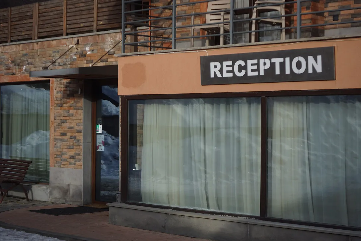 Teghenis hotel reception desk entrance