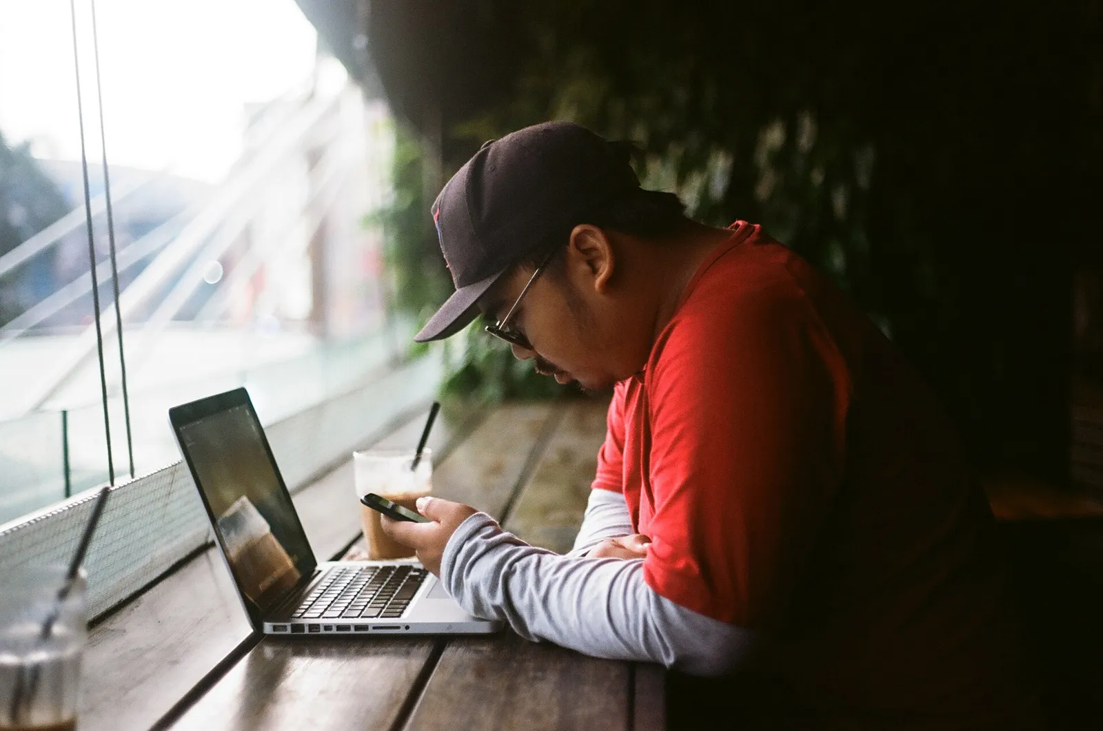 Person comparing prices on a laptop