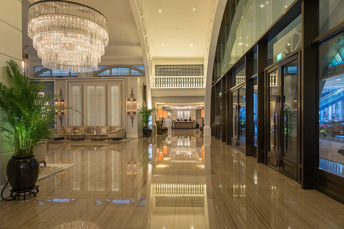 Reception hall with reflecting floor and chandelier at The Fullerton Bay Hotel Singapore